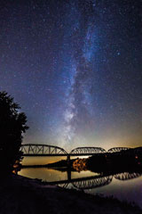 This photo shows the galaxy above the Harmony Way bridge in New Harmony, shot last Nov. 1, with a Canon 5D Mark II and 14mm Rokinon lens.