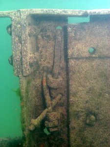 Unknown No. 5. North end Wall with metal frame and bolt detail. View Northwest. 2011.