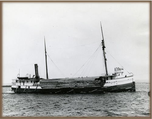 View of vessel’s starboard side with cargo of lumber, circa 1908. Used with permission, Great Lakes Marine Collection of the Milwaukee Public Library / Milwaukee Public Library