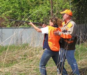 Woman practices with a shotgun