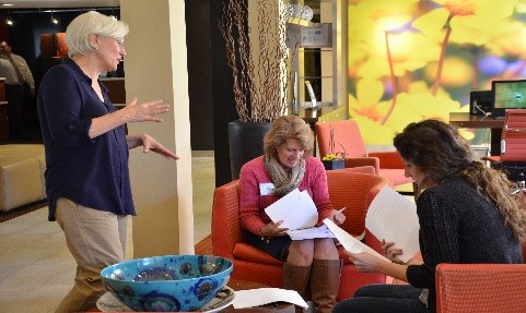 Institute participants in a small group discussion